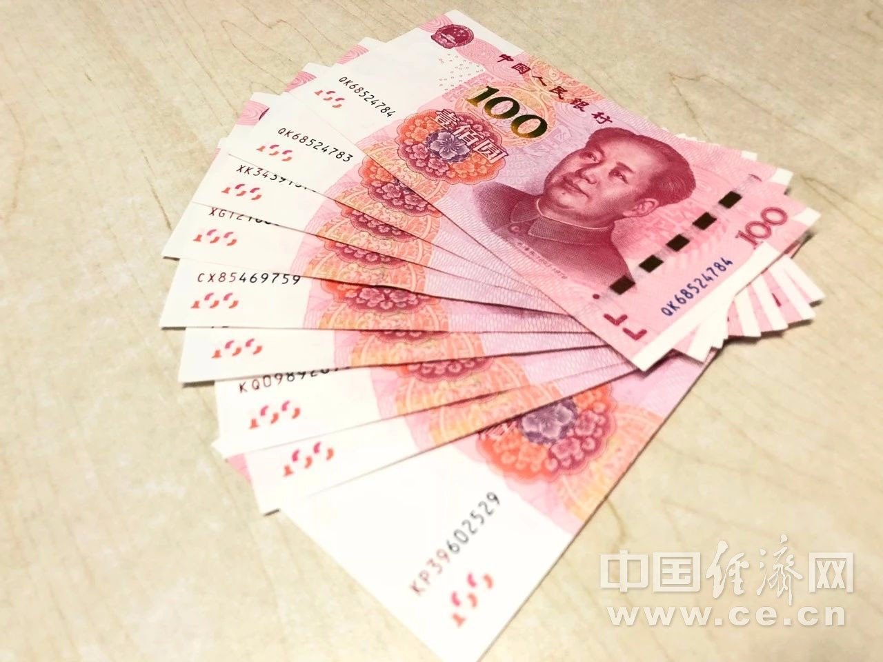 tp钱包换成人民币_人民币包成的花的图片_人民币钱包图片